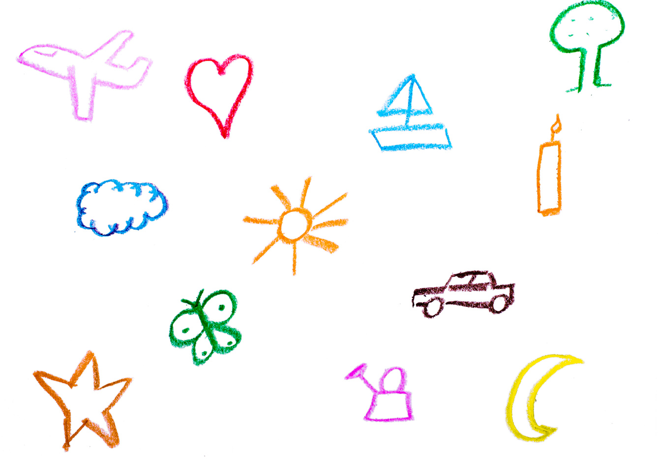 Child paints objects with crayons